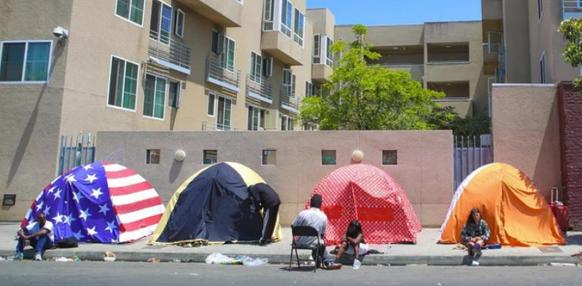 tents in front of housing